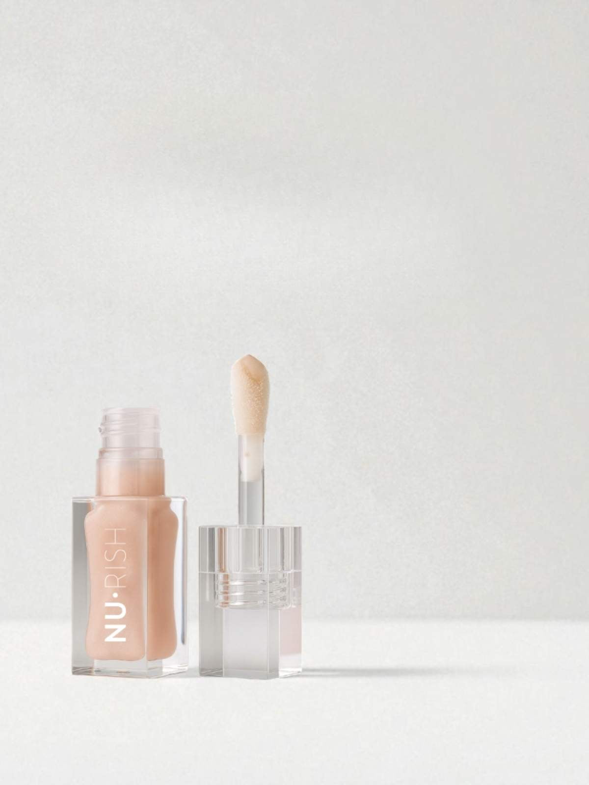 Bannière format mobile avec le lip oil de la marque NURISH pour janvier 2026.