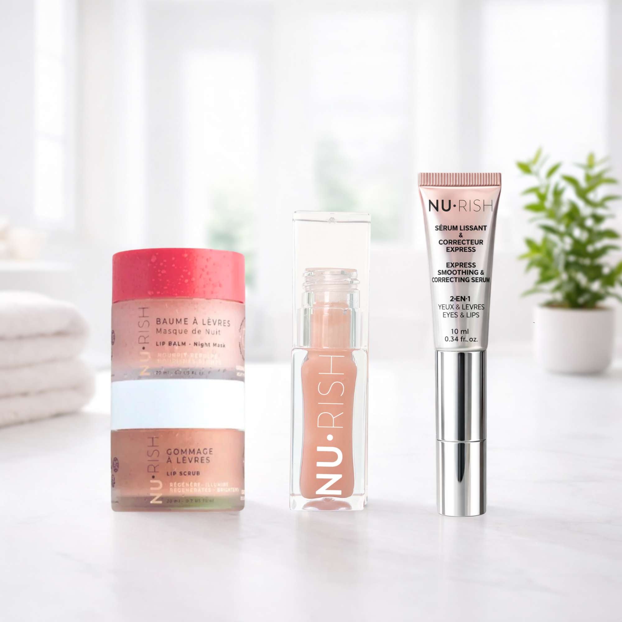Produits de soin pour les lèvres et les yeux de la gamme NU•RISH : un baume à lèvres masque de nuit, un gommage à lèvres, une huile à lèvres et un sérum lissant 2-en-1 pour les yeux et les lèvres, présentés sur un fond doux et lumineux.