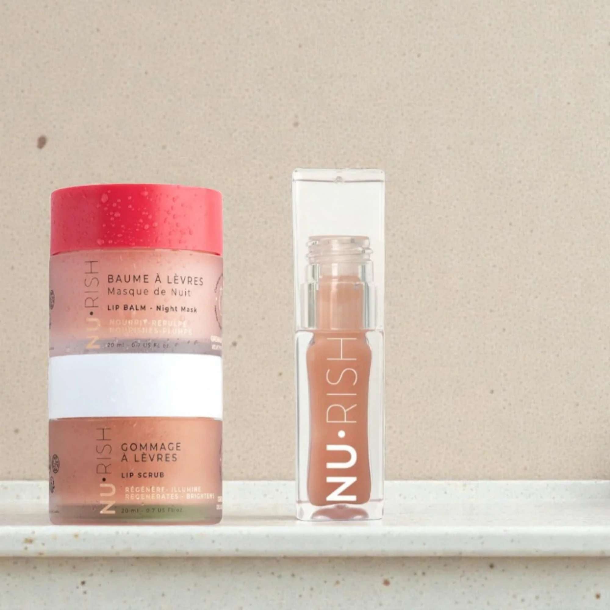 Routine soins des lèvres NU•RISH avec gommage à lèvres, baume à lèvres masque de nuit et huile à lèvres hydratante et repulpante. NU•RISH lip care routine with lip scrub, overnight lip mask, and moisturizing and plumping lip oil.
